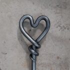 Heart fire poker with log hook